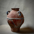 A PAINTED TERRA-COTTA VESSEL