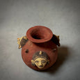 A decorative terracotta vessel