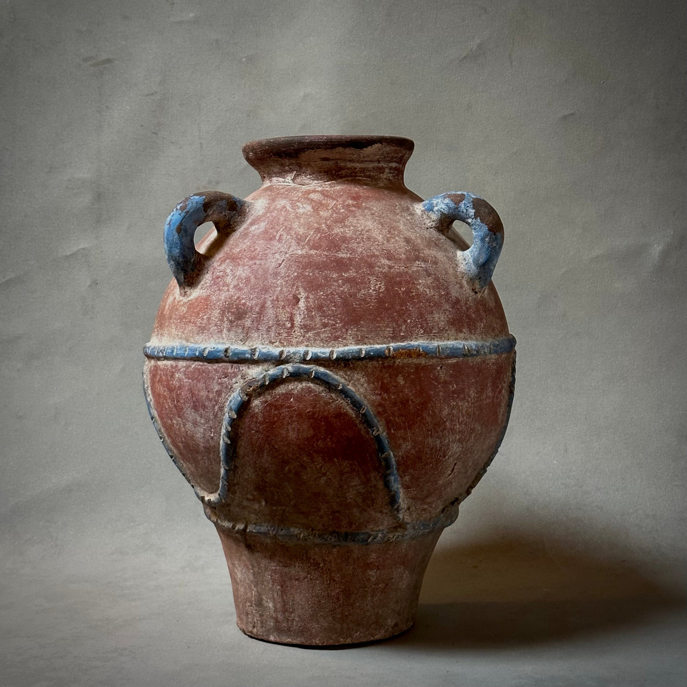 A PAINTED TERRA-COTTA VESSEL