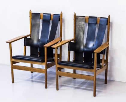 Pair of Leather Strapped Arm Chairs
