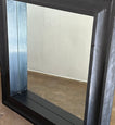 Mirror in Black Frame