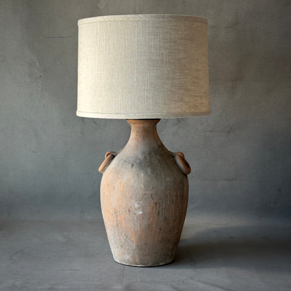 A Terra Cotta Vessel Lamp