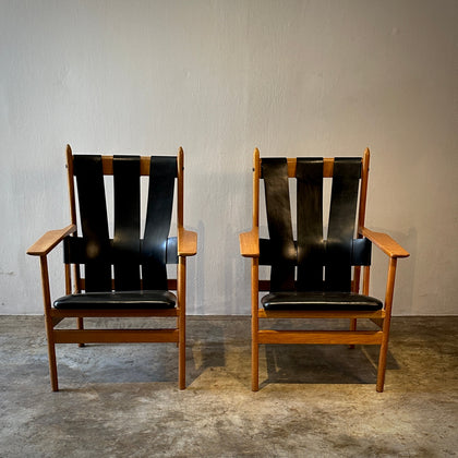 Pair of Leather Strapped Arm Chairs