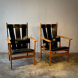 Pair of Leather Strapped Arm Chairs