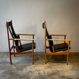 Pair of Leather Strapped Arm Chairs