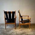 Pair of Leather Strapped Arm Chairs